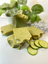 Load image into Gallery viewer, Cucumber Aloe Vera Soap have many benefits for your skin, including:
Hydration: Aloe vera is known for its hydrating properties, and cucumber are high in water content. Together, they can help keep your skin hydrated and healthy.
Skin Tone: Cucumber contains vitamins A, C, and E, which can help lighten your skin tone.
Antibacterial: Aloe vera contains saponins, which have a natural cleansing and antiseptic effect. This can help kill bacteria that cause breakouts and prevent infection of irrit